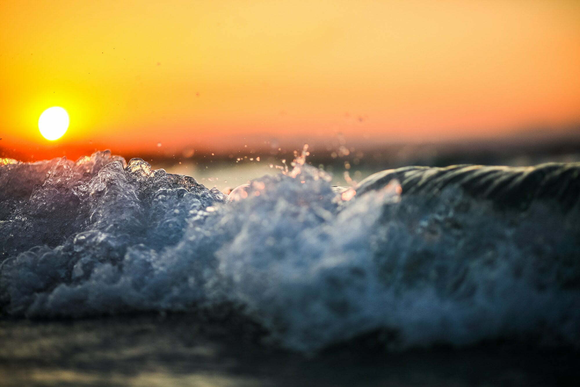 Troubled sea waves at sunset